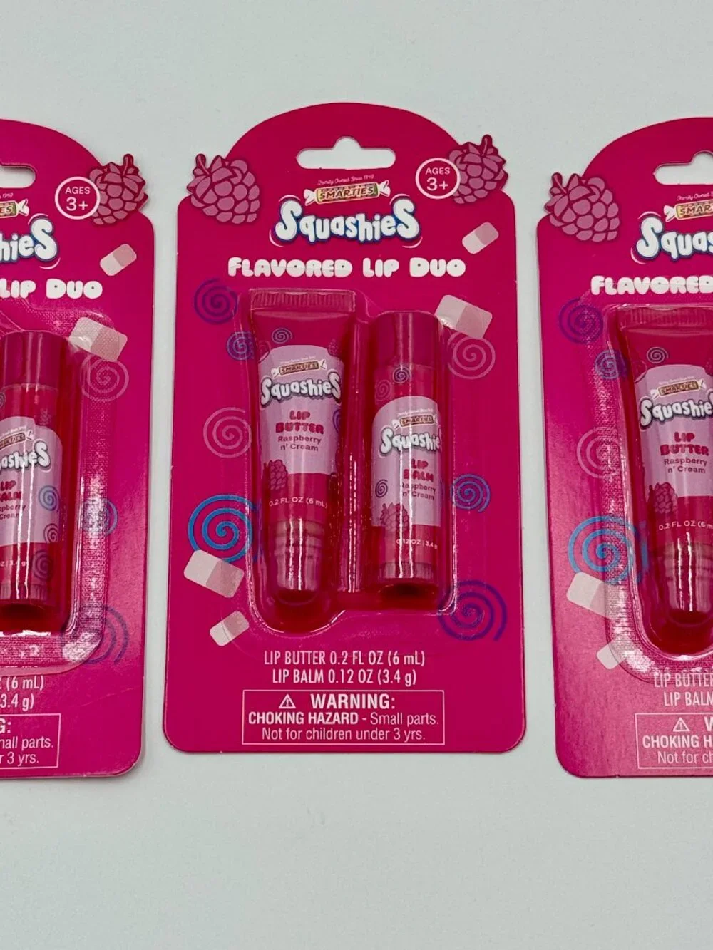 6 Smarties Raspberry N' Cream Flavored Lip Balms & Glosses
